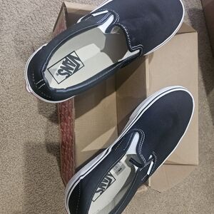 Vans Men's Black and White Slip-On Sneakers